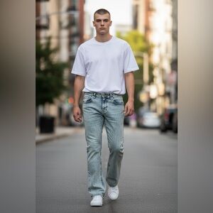 True Religion "Joey" low-rise flare Men’s jeans in a light acid wash, size 34